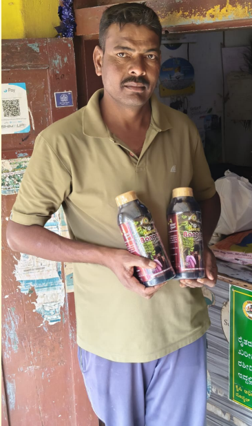 Farmer using Shakthi agricultural products